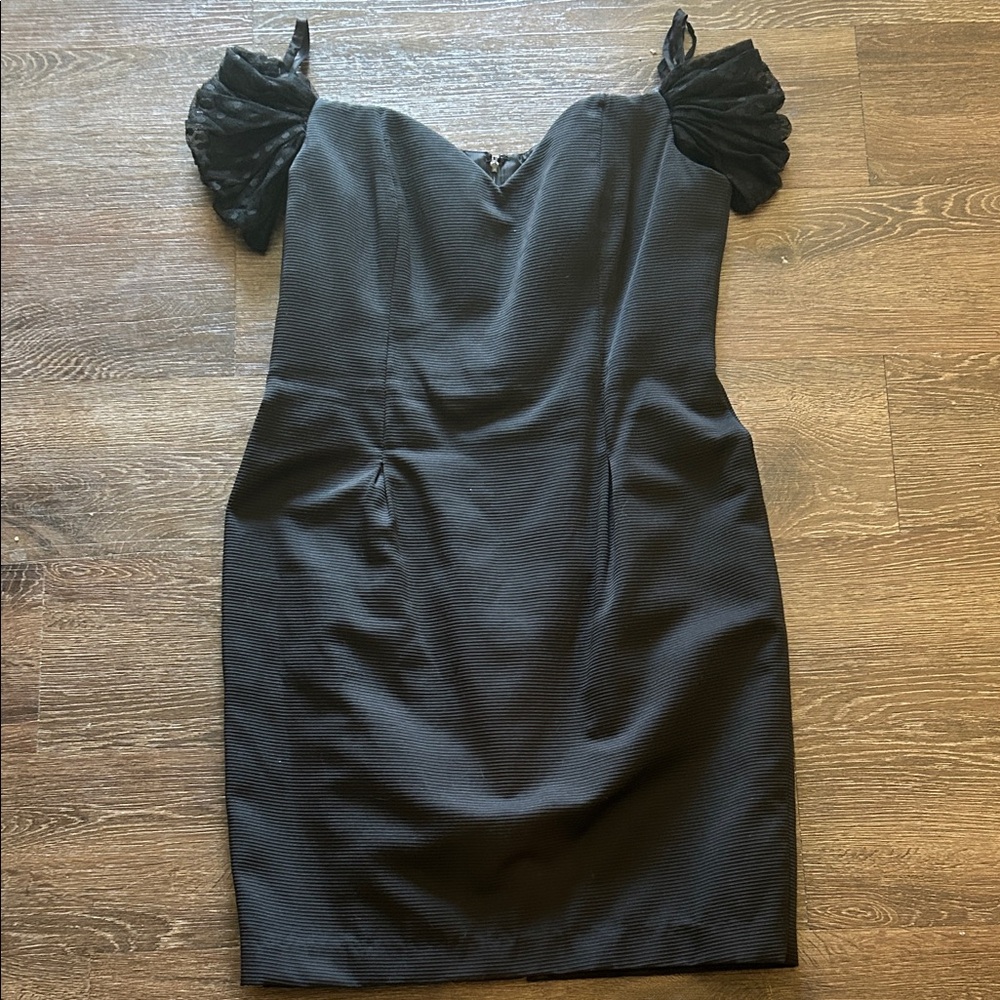 Morton Miles Chic Black Dress with Ruffled Sleeves